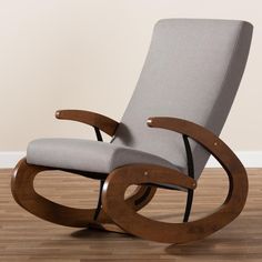 Baxton Studio Kaira Modern and Contemporary Gray Fabric Upholstered and Walnut-Finished Wood Rocking Chair FredCo theFredCo Rocking Chair Design, Contemporary Rocking Chair, Modern Rocking Chair, Wood Rocking Chair, Contemporary Fabric, Baxton Studio, Furniture Hacks, Gray Fabric, Grey Chair