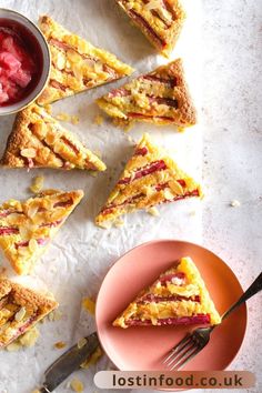 a plate with slices of rhubarb franopiane tart on it