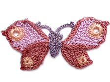 a crocheted butterfly is shown on a white background with the words, free pattern