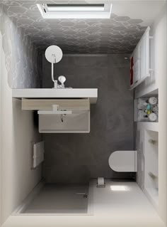 a small bathroom with a toilet and sink