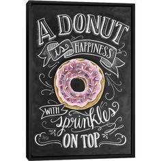 a chalkboard drawing of a donut with sprinkles on top that says, a donut is happiness