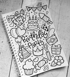 a spiral notebook with birthday party doodles on it