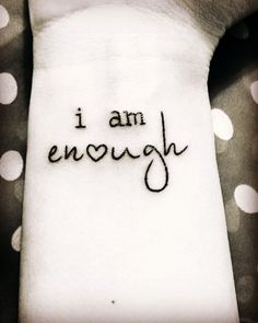 i am enough tattoo on the wrist