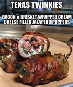 bacon and brineet wrapped cream cheese filled jalapeno poppers on a cutting board