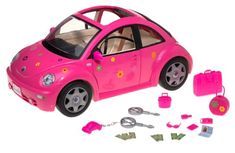 a pink toy car with keys and accessories