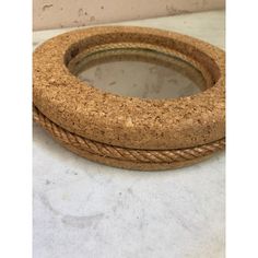 two cork bangles sitting on top of a white counter