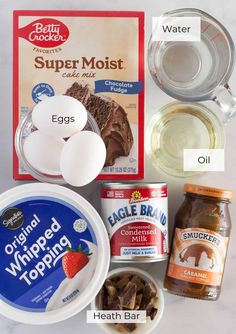 ingredients needed to make an ice cream dessert including eggs, chocolate cake mix and butter