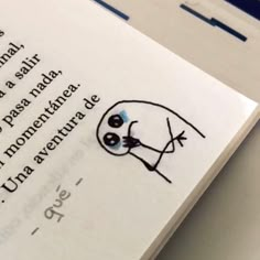 an open book with a drawing of a skull on it's cover and the words written in spanish