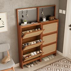 a wooden shoe rack sitting next to a chair in a room with a rug on the floor