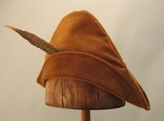 Robin Hood Bycocket - Black / Tan – Tall Toad Hood Hats, Robin Hood Hat, Robin Hood Costume, Medieval Steampunk, Mini Top Hats, Beaded Headbands, Hood Style, Pheasant Feather, Handmade Hats