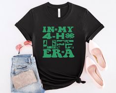 In My 4H Life Era T-shirt, 4-H Era Tee, 4-H Heart Health Shirt, Lucky Goat Tshirt, 4H Shirt, St Patricks Day Cow Tee, Life Tee, 4-H Life Tee HI! Welcome to my shop, I'm pleased to see you here. My shop's main aim is to make you happy. I see you as a friend, not just a customer. Please contact me if you have any questions or want to get a custom-made design. I'm sure you'll love my designs. If you liked the design but didn't like the tshirt color we have, please contact me. I will do my best to m 4 H Club Shirts Designs Ideas, 4-h Shirt Ideas, 4-h Shirts, 4h Designs, 4h Shirts