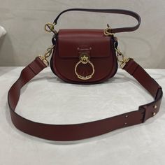 Chloe Tess Crossbody Bag Is Brand New Without Tags. This Beautiful Bag Has Never Been Carried Or Used! Please Review The Pictures As Minor Scratches May Be Present On The Bag. Chloe Mini Tess Day Bag, Elegant Red Saddle Bag With Gold-tone Hardware, Chloe Tess Bag, Dark Academia Bag, Chloe Tess, Chloe Bags, Big Sunglasses, Chloe Handbags, Warm Socks