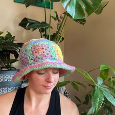 hand crocheted multicolored bucket hat. the slightly floppy brim can be shaped loosely. stretchy and comfy and cute! this hat is a bit oversized, allowing a comfy loose fit. Spring Multicolor Crochet Hat With Curved Brim, Multicolor Curved Brim Crochet Hat For Spring, Colorful Casual Wide Brim Hat, Casual Colorful Wide Brim Hat, Playful Spring Crochet Hat, Playful Multicolor Crochet Hat For Spring, Multicolor Crochet Hat With Short Brim For Spring, Spring Multicolor Crochet Hat With Short Brim, Playful Crochet Bucket Hat For Vacation