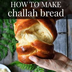 a person holding a piece of bread with the words how to make easy challah bread