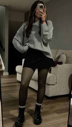 Skirts And Oversized Sweaters, Mini Skirt And Oversized Sweater, Skirt Outfits With Black Tights, Black Denim Mini Skirt Outfit Winter, Mini Skirt Big Sweater, Tucked Sweater Outfit, Red Corduroy Skirt Outfit, Mini Skirt And Hoodie Outfit, Short Skirt And Sweater Outfit