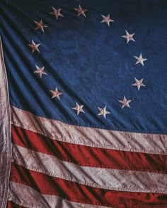 an old american flag with stars on it