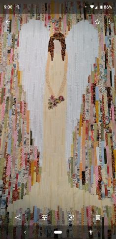 an image of a woman made out of old quilts and paper towels on a cell phone screen