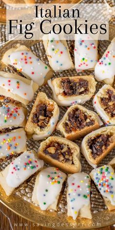 italian cookies with white icing and colorful sprinkles on a gold platter