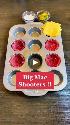 a muffin tray with cupcakes in it and the words, big mac shooters