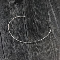 A shimmering Sterling halo that sits right at the clavicle, effortlessly circling the neck. Hand forged and hammered, simple yet classic with a boho vibe, this piece is made with love of solid Sterling Silver. It opens slightly to slip on and then can be gently closed to form around the neck, achieving the perfect fit! Each necklace is slightly adjustable, however, please be sure to measure in order to choose the correct size. Torque Necklace, Cowgirl Jewelry, Gold Halo, Boho Vibe, Neck Collar, Made With Love, Hand Forged, Solid Brass, With Love