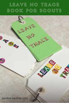 some green and white tags with the words leave no trace, leave for scouts on them