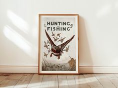 there is a poster on the wall that says hunting and fishing with birds flying around