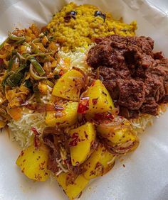 a white plate topped with different types of food