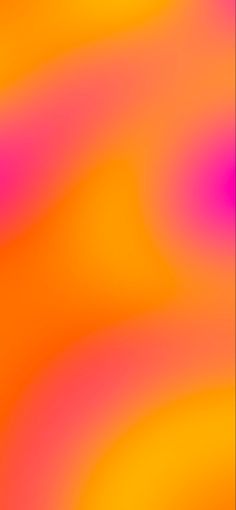 an orange and pink blurry background is shown in this image, it appears to be very colorful