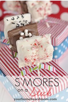 there are many small pieces of cake on top of each other with the words s'mores on it