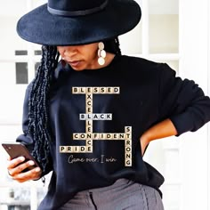 This black excellence scrabble themed t-shirt or sweatshirt is perfect to wear for Black History Month, Juneteenth, or any day!  Not only will this shirt make a great Christmas gift for any black man or black woman, it would be a great birthday gift. Black Pride apparel/ human rights shirts/ equality shirts can be hard to find so look through our "Black Culture" section on our store to find more shirts in the following themes: Black History Month, Black Girl Magic, Juneteenth, black pride, blessed.  HOW TO ORDER (Please follow the instructions below) 1. Message me if you would like to order one of our shirts, but would like to customize it by adding a name. I can make a custom listing for you, but I will need to know what name you would like on the shirt and which of our designs you would Graphic Sweatshirt Outfit Black Women, Tshirt Outfit Black Women, T Shirt Customize Diy, Birthday Shirt Ideas Women, White Guys With Black Women, Pride Apparel, Equality Shirt, Men In Black, Black Pride