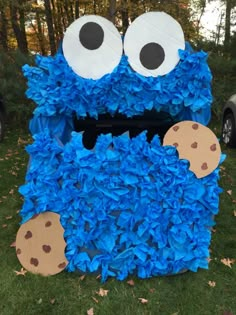 a cookie monster made out of blue flowers