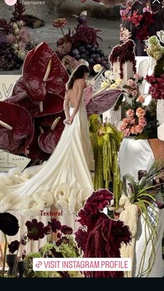 a woman in a wedding dress surrounded by flowers and other things that are on display