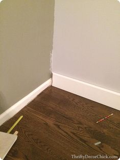 the corner of a room that is being painted