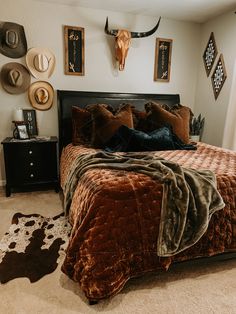 Western boho home lush velvet bedding western home inspo. Cowhide rug. Cow skull Aztec decor Texas Style Bedroom Ideas, Cow Print Room, Country Themed Bedroom, Western House, Cowhide Decor, Country Bedroom Decor