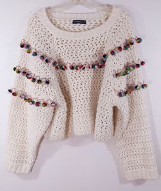 "Women's Sweater Handmade Boho Crocheted Knitted Excellent Vintage Women's Size L by ZARA KNIT BANGALADESH This Beautiful boho hippie chic sweater has a handmade woven crochet pattern in cream beige with 70's style colorful pom pom trim, long sleeves and shorter cool length. Super high quality. Heavy duty construction and materials. Excellent condition. Length- 20.5\" Bust- 25.x25\" Waist - 25\"x2 Sleeves- 24\"" Woven Crochet, Vintage High Waisted Shorts, Pom Pom Sweater, Sweater Handmade, Chic Sweater, Boho Sweater, Boho Hippie Chic, Floral Pocket, Long Sleeve And Shorts