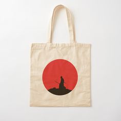 a tote bag with an image of a man holding a baseball bat on it