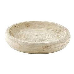 a wooden bowl on a white background