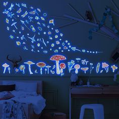 a bedroom with blue lighting and various mushrooms on the wall