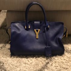 Cobalt Blue Saint Laurent Bag. In Good Condition. The Leather Is Soft So It Has A Couple Of Scratches On It. 100% Authentic. Duster Bag Included. Saint Laurent Bags, Saint Laurent Bag, Kate Spade Top Handle Bag, Womens Tote Bags, Cobalt Blue, Cobalt, A Couple, Saint Laurent, Top Handle Bag