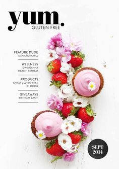 the cover of yum magazine with strawberries and flowers