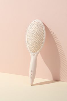 If you're in a tangle, the Smooth & Polish Detangling Brush is your go-to for perfectly detangled, smooth hair. Ball-tipped nylon pins untangle hair and exfoliate the scalp, smoothing out frizz Ultra-lightweight handle and soft, flexible cushion make brushing effortless & comfortable Soft-touch finish provides a non-slip-grip High-quality design and construction deliver exceptional durability Works for all hair types, wet or dry The Body Shop Hair Brush, Bday Wishlist Hair Styling Tools, Hair Washer Brush, Rapunzel Of Sweden, Baby Hair Brush, Curly Hair Brush, Natural Shampoo And Conditioner, Small Business Packaging Ideas, Business Packaging