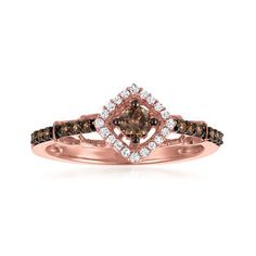 LeVian - Le Vian "Chocolatier" .31ct t. w. Chocolate Diamond Ring, Vanilla Diamond Accents in 14kt Strawberry Gold. Size 8. With a rich history dating back to the 15th century, Le Vian jewelry is well known for its decadent designs and innovative use of color. This luxurious "Chocolatier" ring sparkles with .31 ct. t. w. round brilliant-cut brown diamonds in black rhodium and an icy round brilliant-cut white diamond halo. Set in polished 14kt rose gold. 1/4" wide. Le Vian white and brown diamond Brown Diamond Ring Fine Jewelry, Brown Diamond Ring With Accents For Anniversary, Brown Diamond Ring With Diamond Accents For Anniversary, Anniversary Brown Diamond Ring With Accents, Brown Round Diamond Ring In Fine Jewelry Style, Brown Diamond Ring In Fine Jewelry Style, Fine Jewelry Brown Diamond Ring, Brown Diamond Anniversary Ring, Brown Prong-set Ring For Anniversary