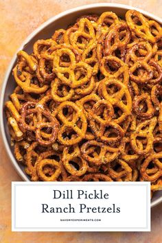 a bowl full of pickle ranch pretzels with the words dill pickle ranch pretzels