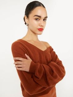 Fine Knit Cashmere V-neck Tops, Classic V-neck Fall Sweater, Classic Fall V-neck Sweater For Loungewear, Elegant V-neck Sweater For Loungewear, Brown Cashmere V-neck Sweater, V-neck Sweater For Loungewear, Chic Fine Knit V-neck Sweater For Fall, Chic V-neck Fine Knit Sweater, Cozy Fine Knit V-neck Tops