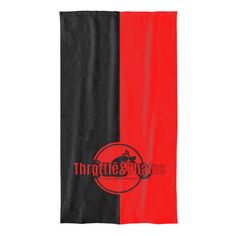 a red and black towel with the word throttle & bainns on it