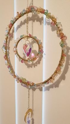 a circular piece of jewelry hanging on a wall