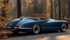 an old blue sports car is parked on the side of the road in front of some trees