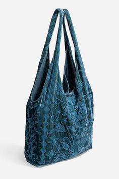 Thoughtfully crafted from a luxurious silk blend, the Talithia Velvet Slouchy Tote is embellished with intricate tone-on-tone floral embroidery in a rich peacock shade for a unique multi-dimensional look. Featuring a wide top opening and an interior slip pocket, this bag is finished with a metal snap closure at the top. Add to your daily look for a hint of drama and eclectic style. Women's Velvet Slouchy Tote Bag by Johnny Was in Peacock, Silk, Floral Johnny Was Bag, Rich Stuff, Velvet Bags, Ruffle Tote Bag, Cyanotype Bag, Hobo Bags, Trendy Bags, Unique Embroidery, Eclectic Fashion Style