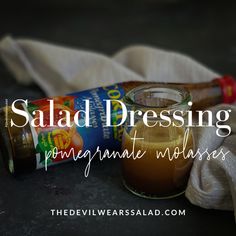 a bottle of salad dressing next to a napkin