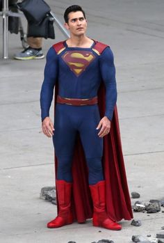 the man is dressed up as superman